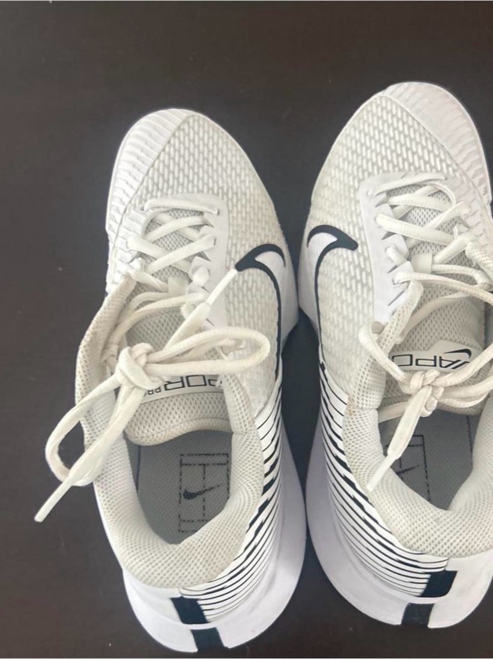 Nike White Sneakers with Black Swoosh